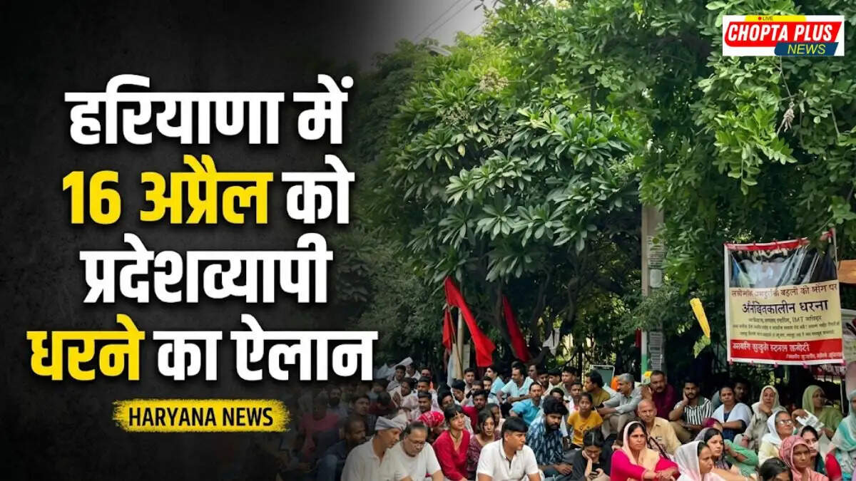 Haryana police standing near workers protesting in Manesar IMT area on April 16